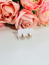 White Peacock stud earrings